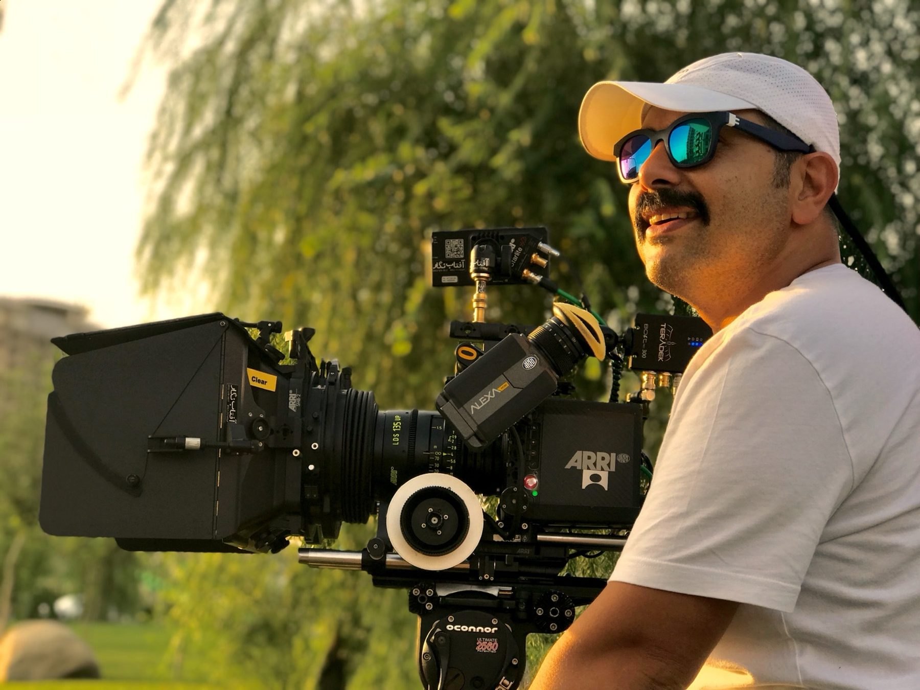 Morteza Hodaei with ARRI camera in golden light
