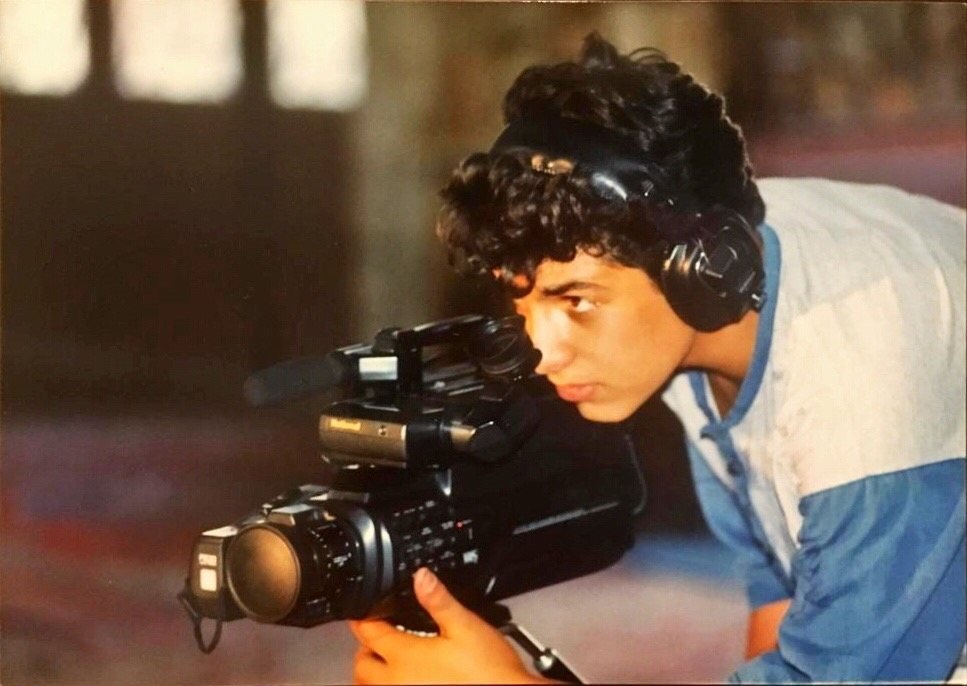Young Morteza Hodaei with camera